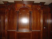 Decorative bookcase with columns and corbels