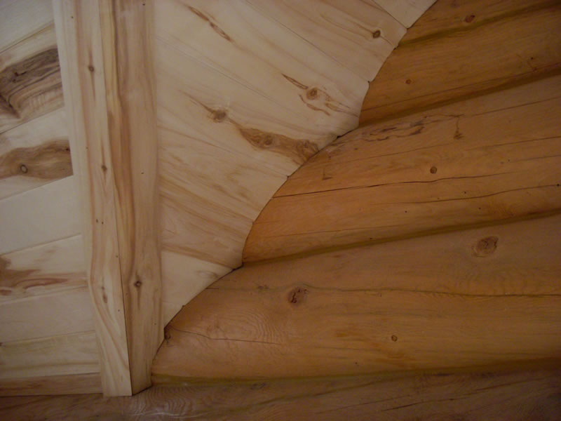 Tongue and groove ceiling scribed into logs